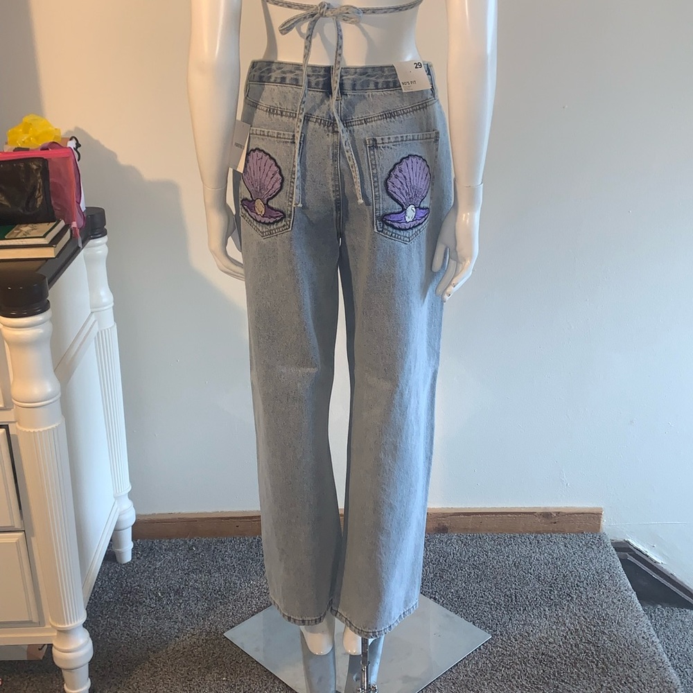 Women's Blue Jeans with Purple Shell Design